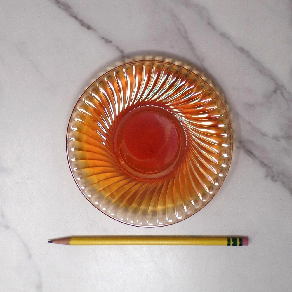 Vintage Irridescent Amber Carnival Glass Swirl Saucer, set of 2